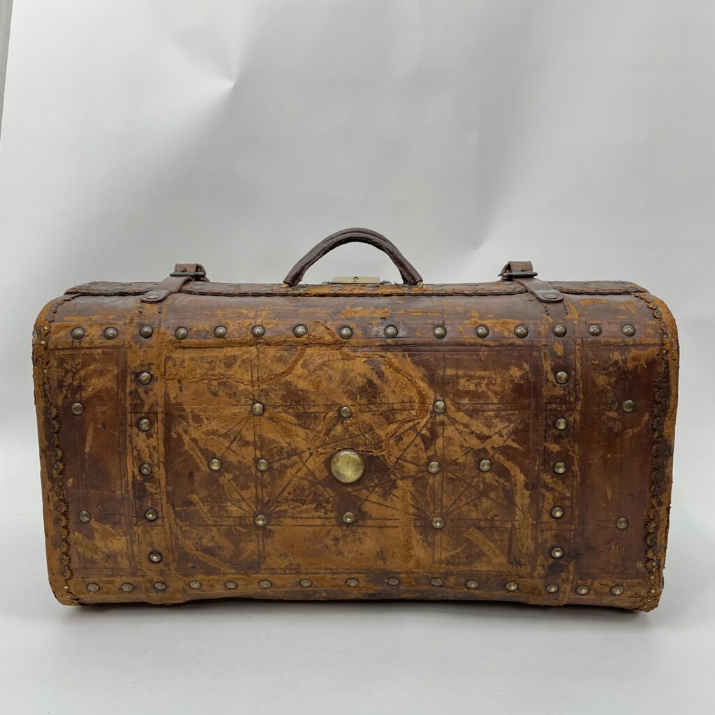 A vintage suitcase bag, after receiving a full restoration